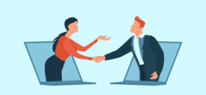 Image of two people shaking hands.