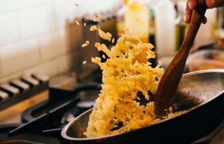 pexels-anna-tarazevich-6937425 Fried rice being tossed in wok
